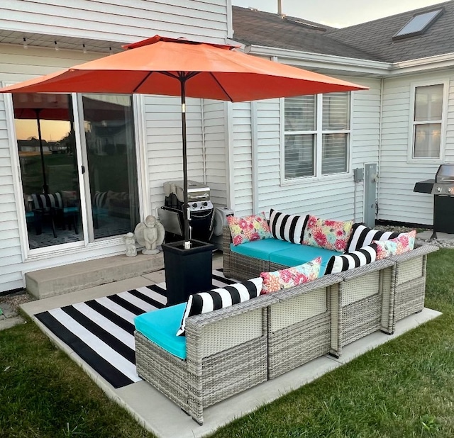 view of patio with an outdoor hangout area and grilling area