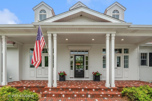 doorway to property with covered porch