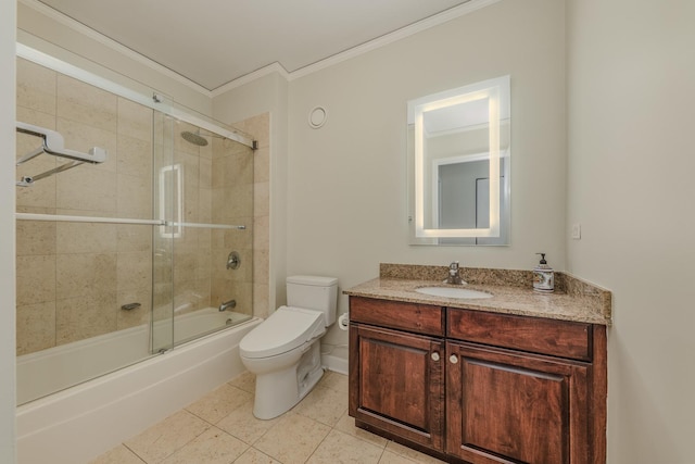 bathroom featuring crown molding, shower / bath combination with glass door, toilet, vanity, and tile patterned flooring