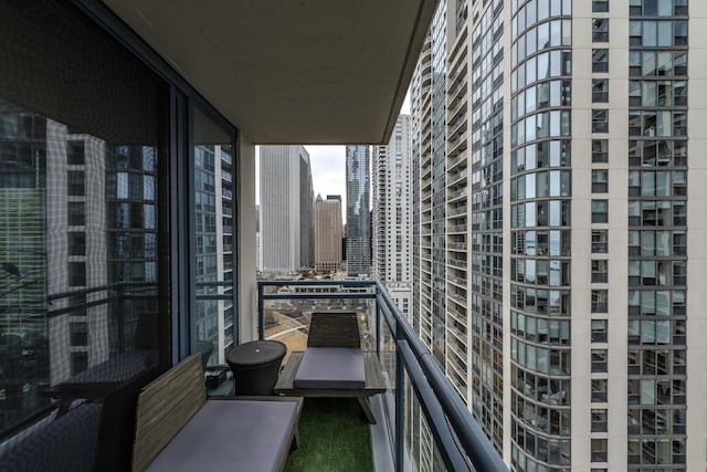 balcony featuring a city view