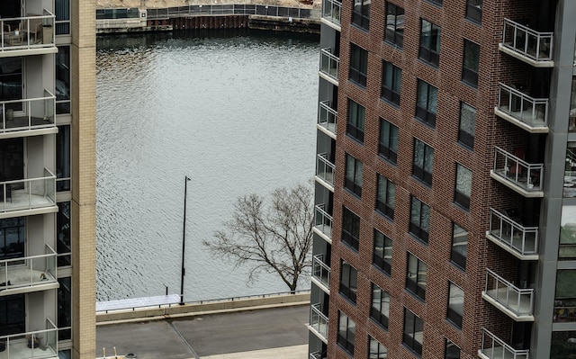 view of property with a water view