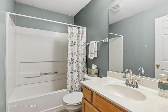 bathroom with toilet, vanity, shower / bath combo with shower curtain, and visible vents