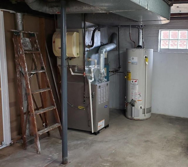 utility room featuring heating unit and water heater