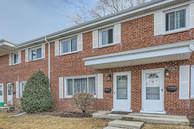 multi unit property featuring brick siding