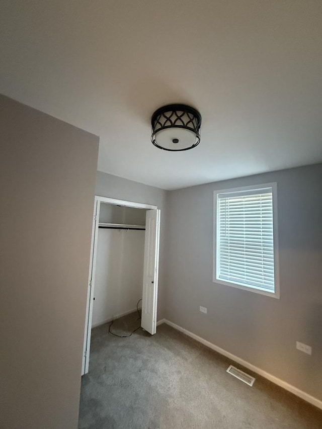 7929 S Manistee Ave, Chicago, IL 60617 - unfurnished bedroom with carpet and a closet