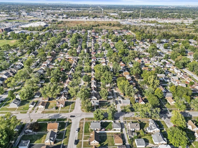 birds eye view of property with a residential view