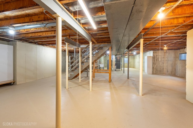 unfinished basement with stairs