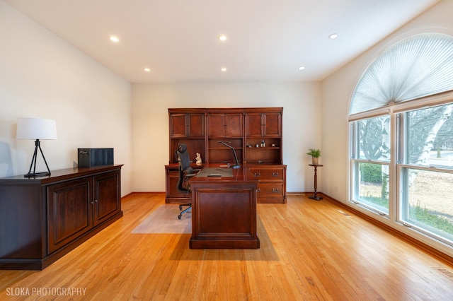 home office featuring light wood-style flooring, baseboards, and recessed lighting