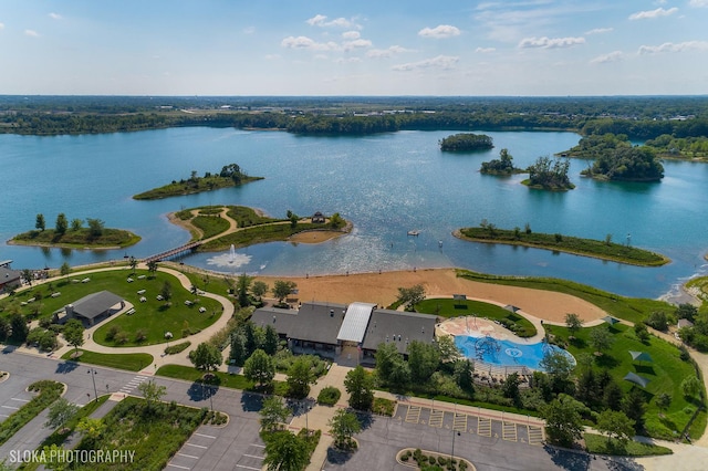 drone / aerial view with a water view