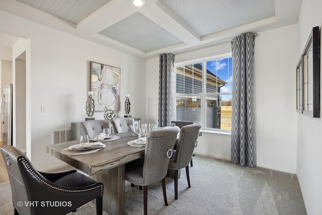 dining room with carpet flooring, beamed ceiling, coffered ceiling, and baseboards