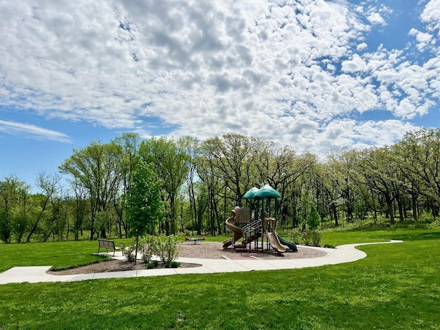 community play area with a lawn