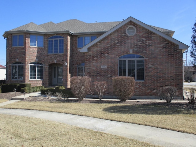 8032 Abbey Rd, Tinley Park, IL 60477 - traditional-style house featuring a front yard and brick siding