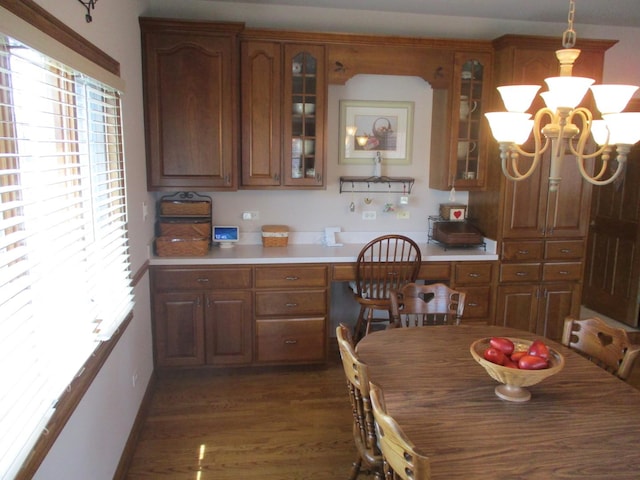 8032 Abbey Rd, Tinley Park, IL 60477 - dining room with dark wood-style flooring, a chandelier, and baseboards