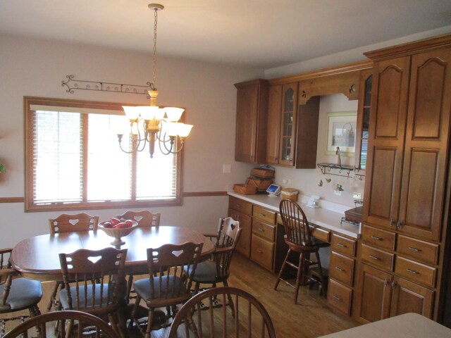 8032 Abbey Rd, Tinley Park, IL 60477 - dining area with wood finished floors and a chandelier