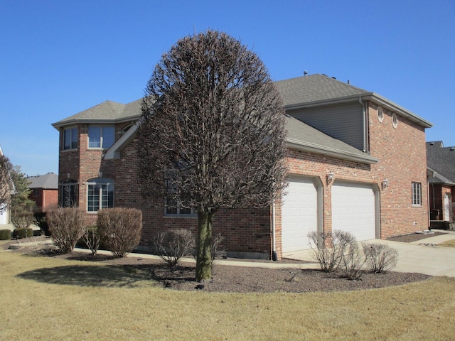 8032 Abbey Rd, Tinley Park, IL 60477 - view of front of house with brick siding, concrete driveway, roof with shingles, a front yard, and a garage