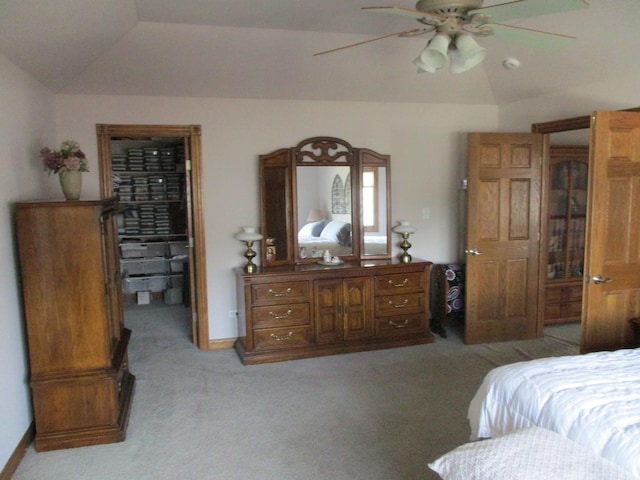 8032 Abbey Rd, Tinley Park, IL 60477 - bedroom with lofted ceiling, light carpet, a walk in closet, and a ceiling fan