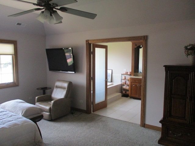 8032 Abbey Rd, Tinley Park, IL 60477 - bedroom with light colored carpet, baseboards, a ceiling fan, lofted ceiling, and ensuite bathroom