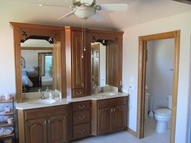 8032 Abbey Rd, Tinley Park, IL 60477 - full bath featuring ceiling fan, tile patterned floors, double vanity, toilet, and ensuite bathroom
