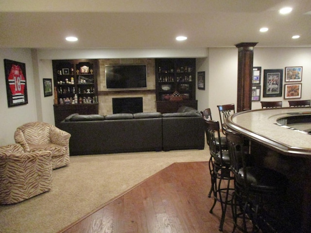 8032 Abbey Rd, Tinley Park, IL 60477 - living room with wood finished floors, recessed lighting, a fireplace, and decorative columns