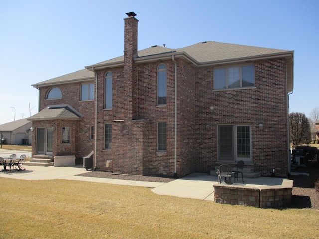 8032 Abbey Rd, Tinley Park, IL 60477 - back of property with a patio area, entry steps, a chimney, and a yard