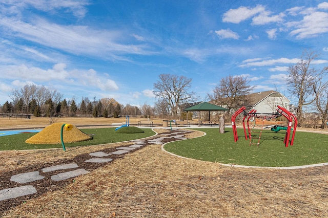 communal playground with a gazebo and a yard