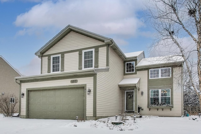 traditional home featuring an attached garage