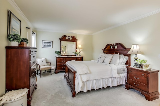 bedroom with crown molding and light colored carpet