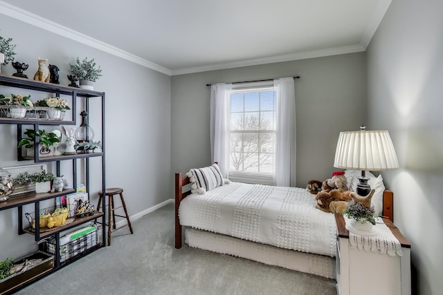 bedroom with carpet floors, baseboards, and crown molding