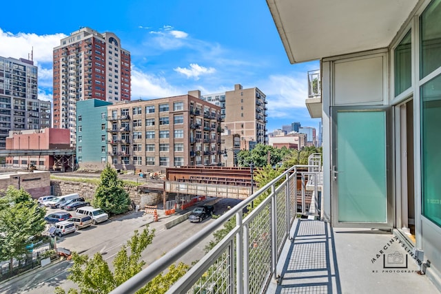 balcony featuring a view of city