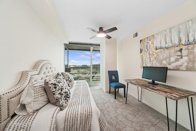 carpeted bedroom featuring access to outside, floor to ceiling windows, ceiling fan, and visible vents