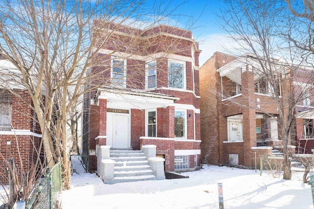 view of front of home with brick siding