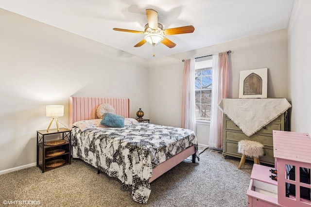 carpeted bedroom featuring ceiling fan and baseboards