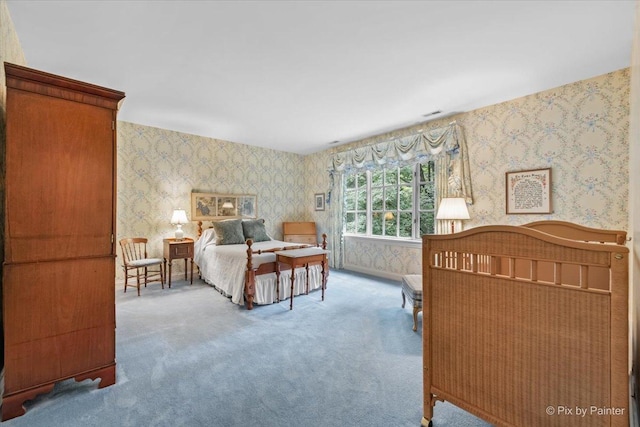 carpeted bedroom featuring wallpapered walls