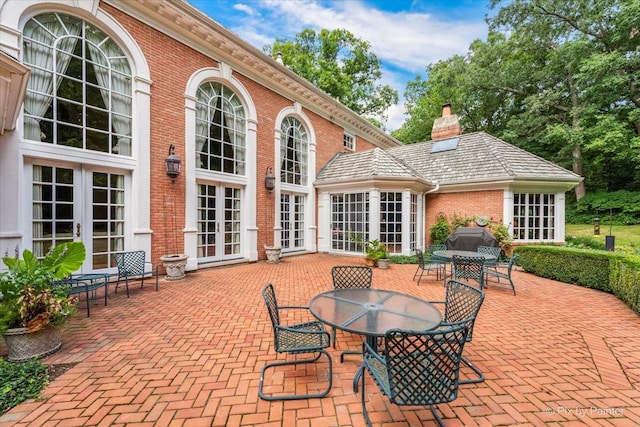 view of patio with french doors and outdoor dining area