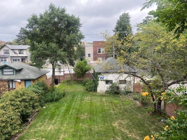 view of yard with fence