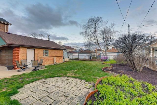 view of yard featuring a patio and fence