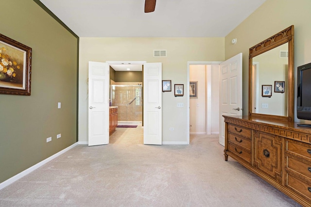 bedroom featuring light carpet, visible vents, and baseboards