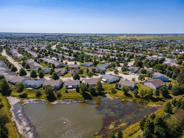 aerial view with a water view and a residential view