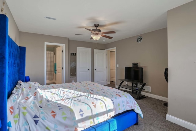 carpeted bedroom featuring ensuite bathroom, a ceiling fan, visible vents, and baseboards