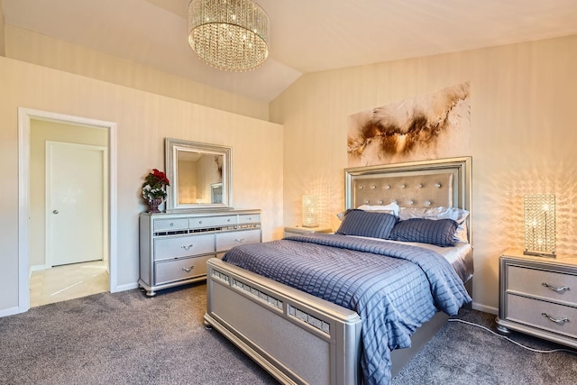 bedroom featuring baseboards, vaulted ceiling, a notable chandelier, and carpet flooring