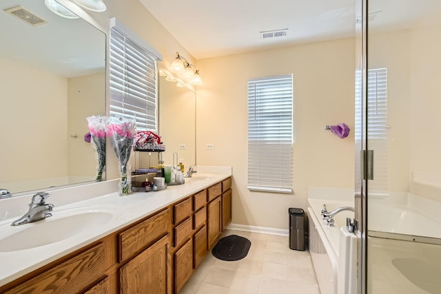 full bathroom featuring a bath, visible vents, and a sink