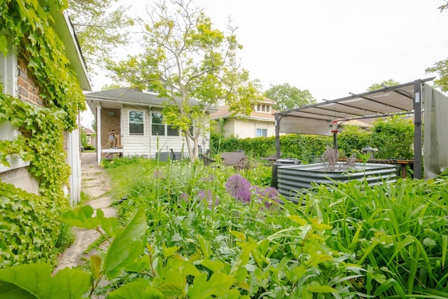 7940 S Oglesby Ave, Chicago, IL 60617 - view of yard featuring a pergola