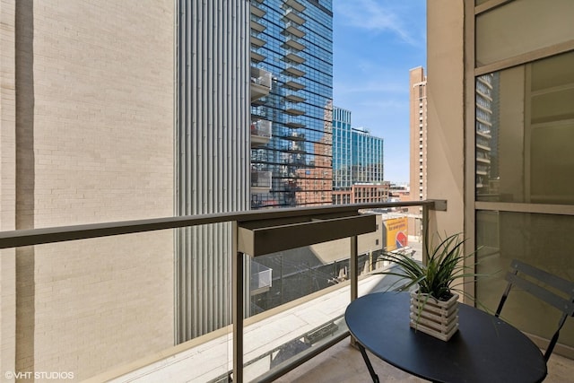 balcony featuring a city view