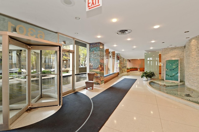 building lobby featuring visible vents