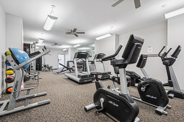 workout area featuring a ceiling fan