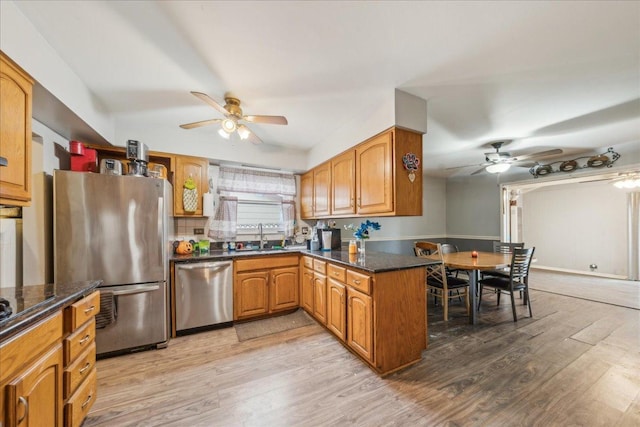 9 Forest Ln, Elk Grove Village, IL 60007 - kitchen with a sink, a ceiling fan, light wood-style floors, and stainless steel appliances