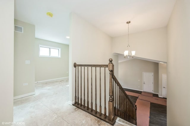 5912 Prairie Ridge Rd, Crystal Lake, IL 60014 - stairway with a chandelier and baseboards