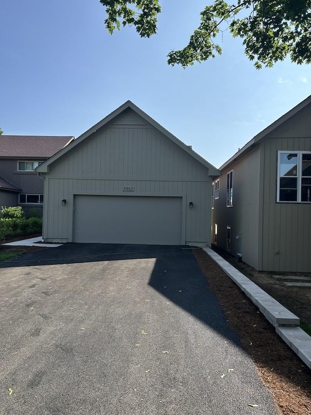 5912 Prairie Ridge Rd, Crystal Lake, IL 60014 - view of property exterior featuring driveway and an attached garage