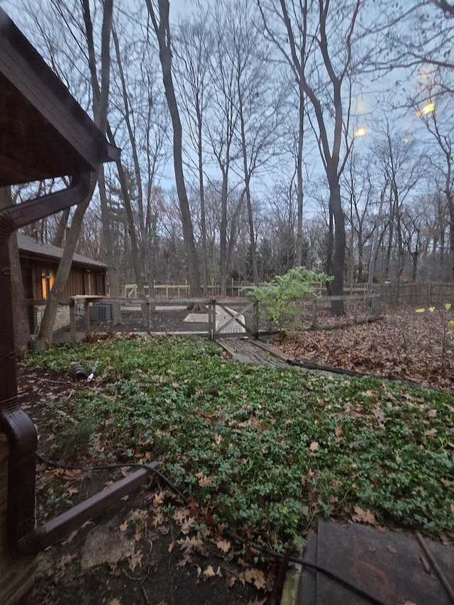 view of yard featuring a gate and fence