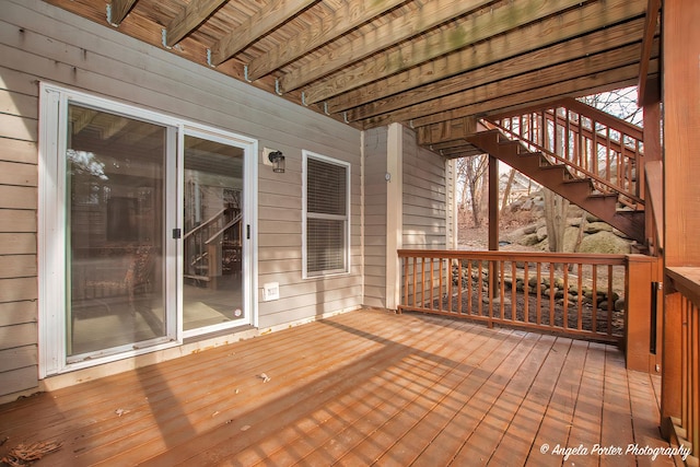 wooden terrace featuring stairway